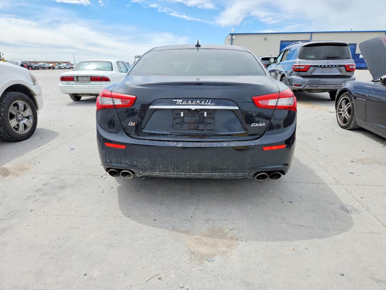 2014 Maserati Ghibli S Black vin: ZAM57RTA7E1090027