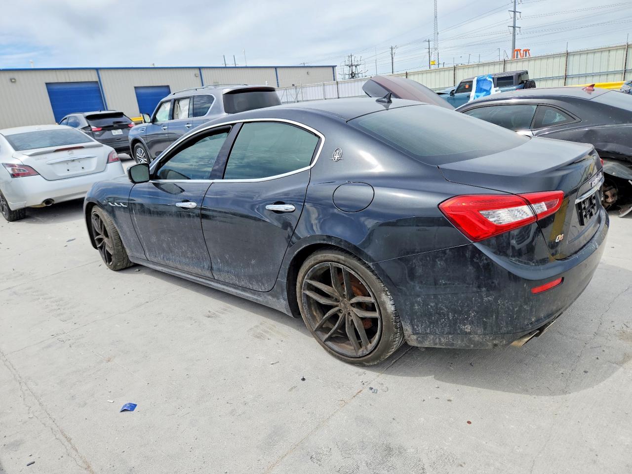 2014 Maserati Ghibli S Black vin: ZAM57RTA7E1090027