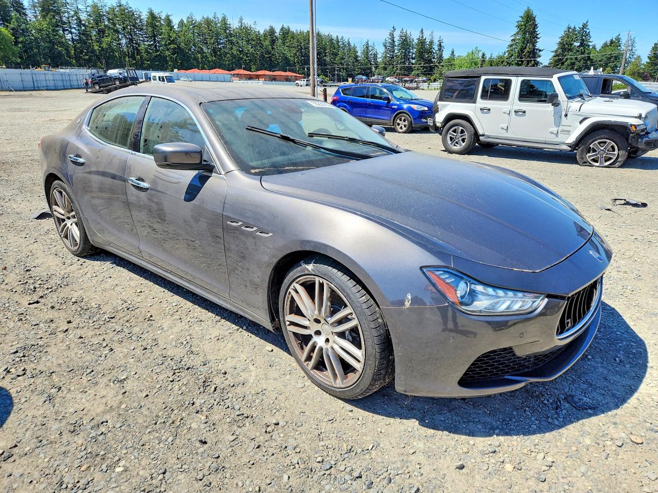 2014 Maserati Ghibli S Silver vin: ZAM57RTA7E1113595