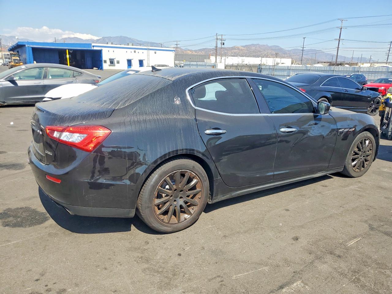 2014 Maserati Ghibli S Black vin: ZAM57RTA7E1117842