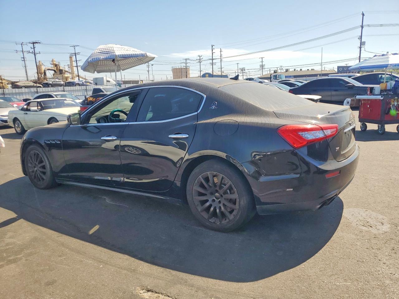 2014 Maserati Ghibli S Black vin: ZAM57RTA7E1117842