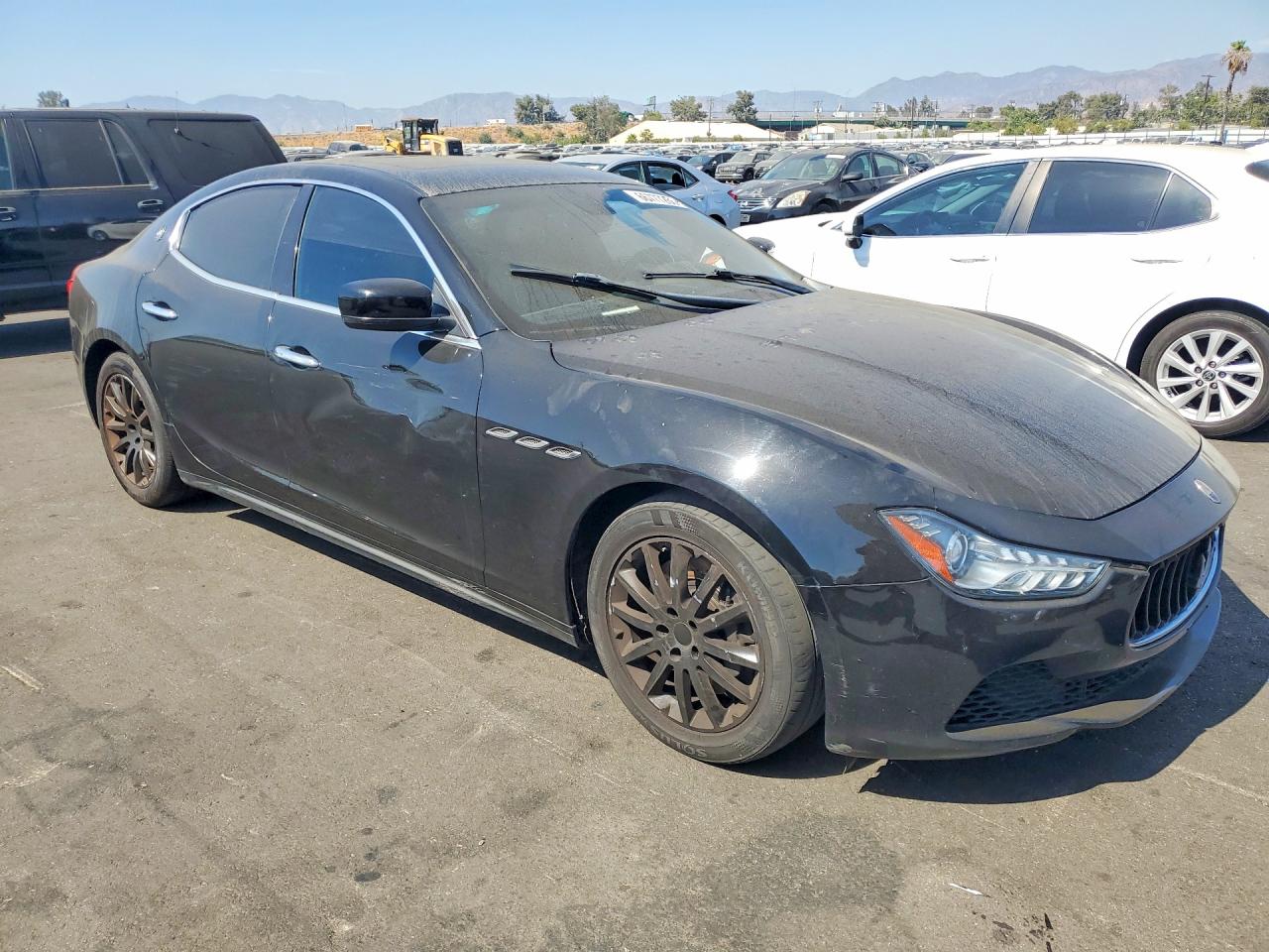2014 Maserati Ghibli S Black vin: ZAM57RTA7E1117842