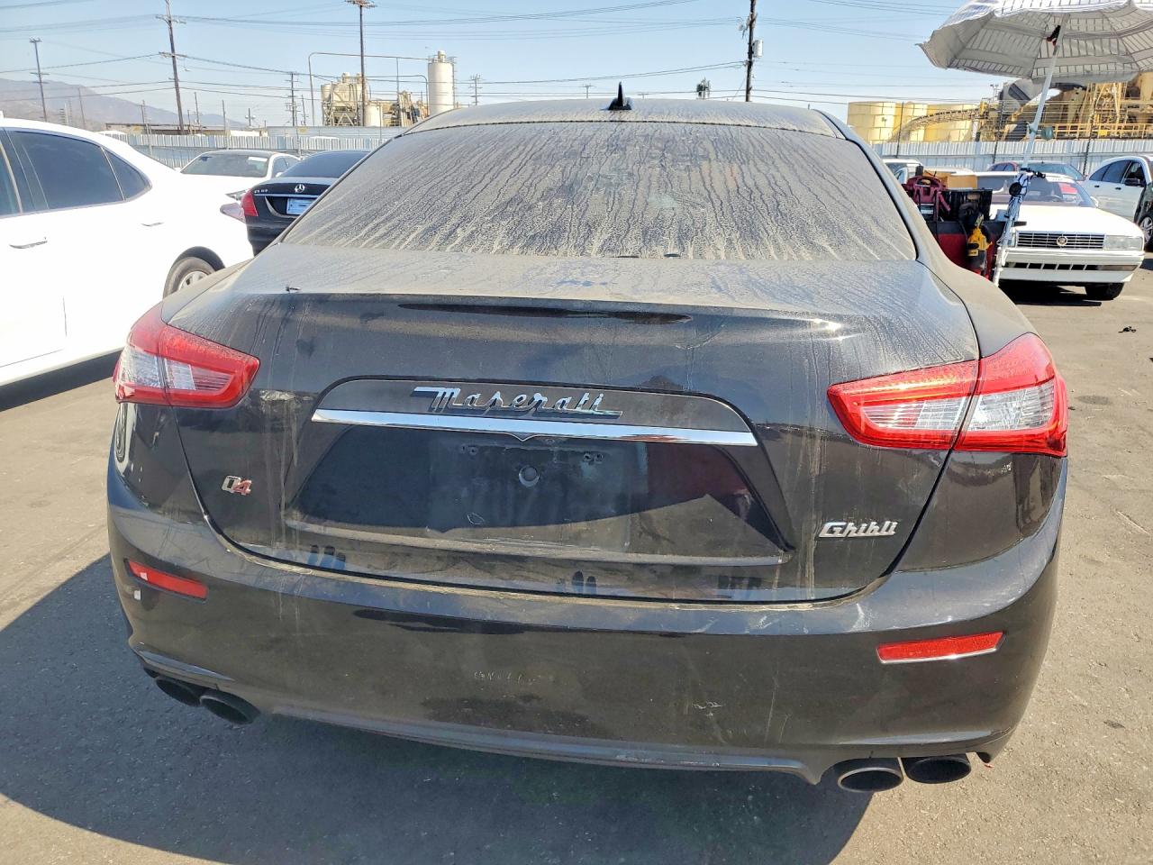 2014 Maserati Ghibli S Black vin: ZAM57RTA7E1117842