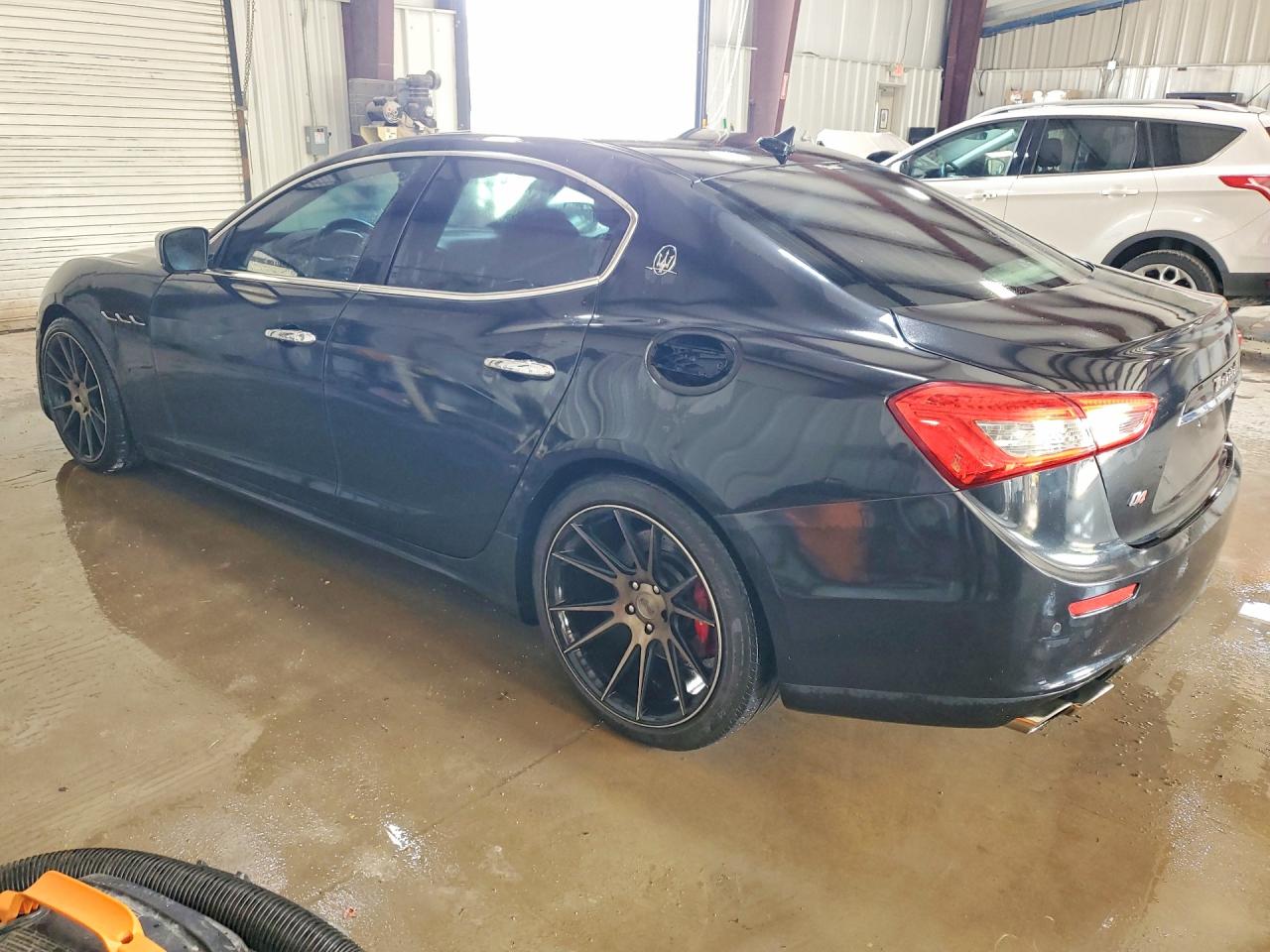 2014 Maserati Ghibli S Black vin: ZAM57RTA9E1090028