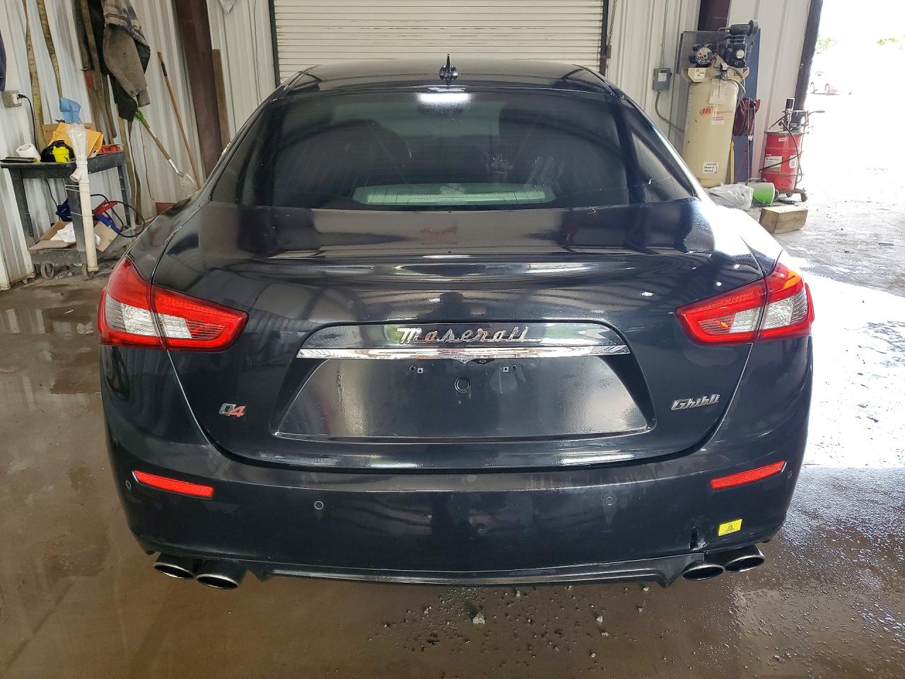 2014 Maserati Ghibli S Black vin: ZAM57RTA9E1090028