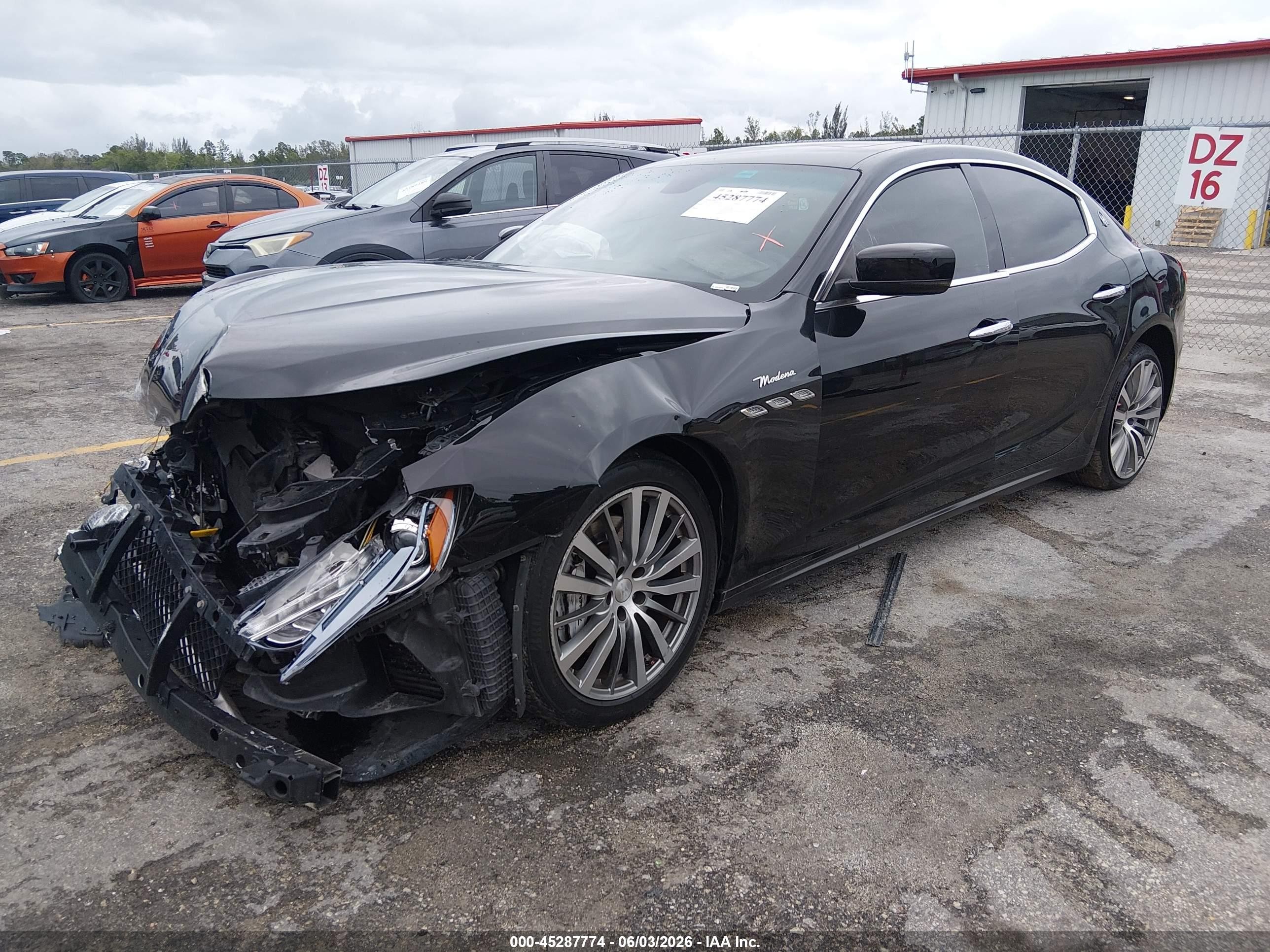 2016 Maserati Ghibli   Black vin: ZAM57XSA1G1173879