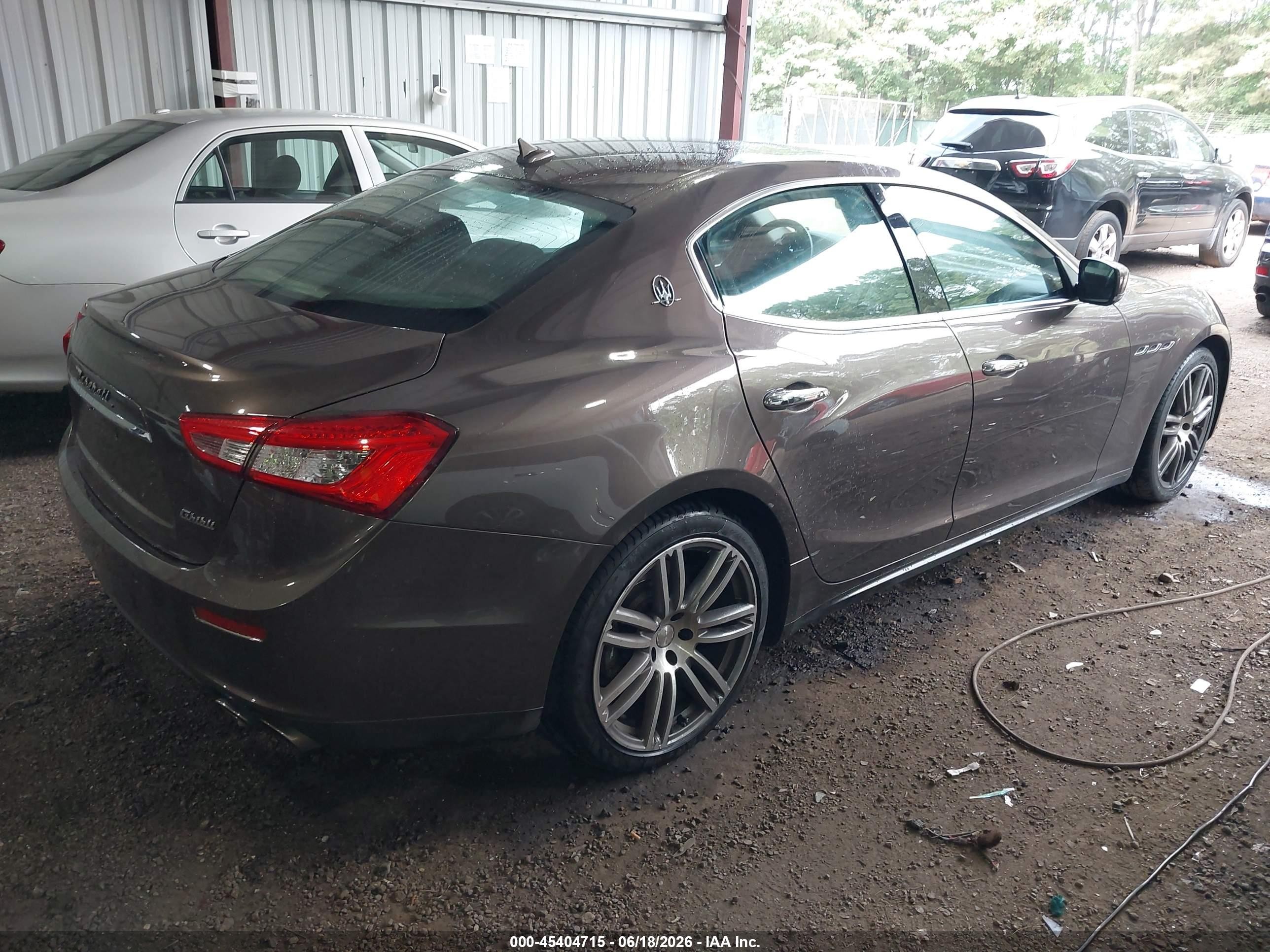 2014 Maserati Ghibli   Brown vin: ZAM57XSA2E1127894
