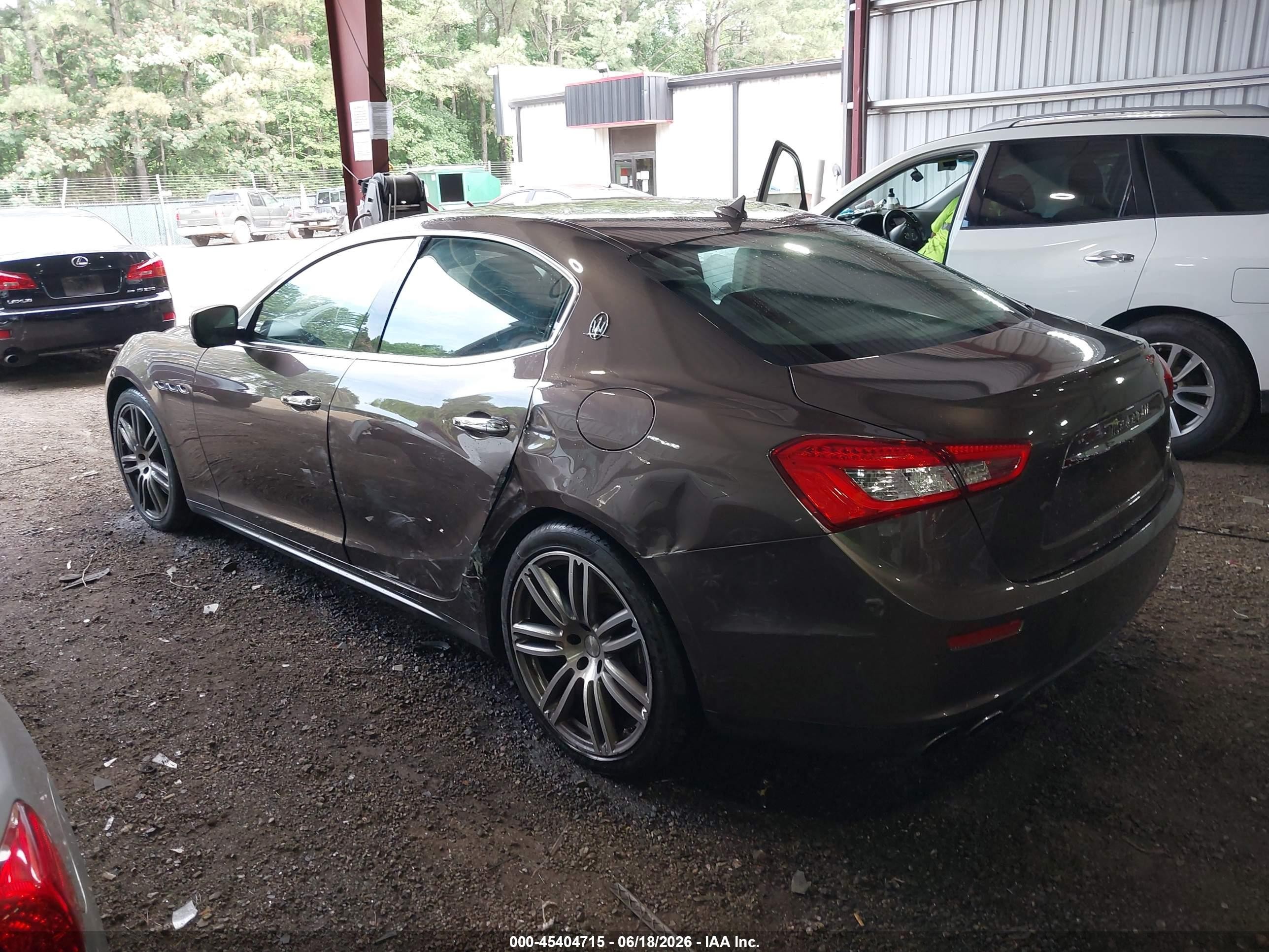 2014 Maserati Ghibli   Brown vin: ZAM57XSA2E1127894
