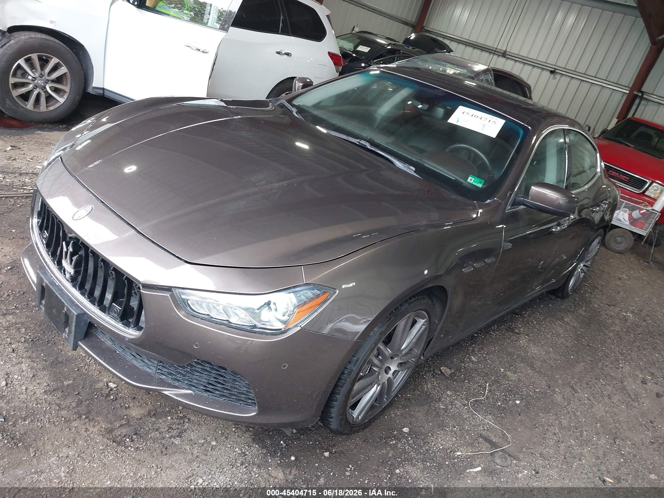 2014 Maserati Ghibli   Brown vin: ZAM57XSA2E1127894