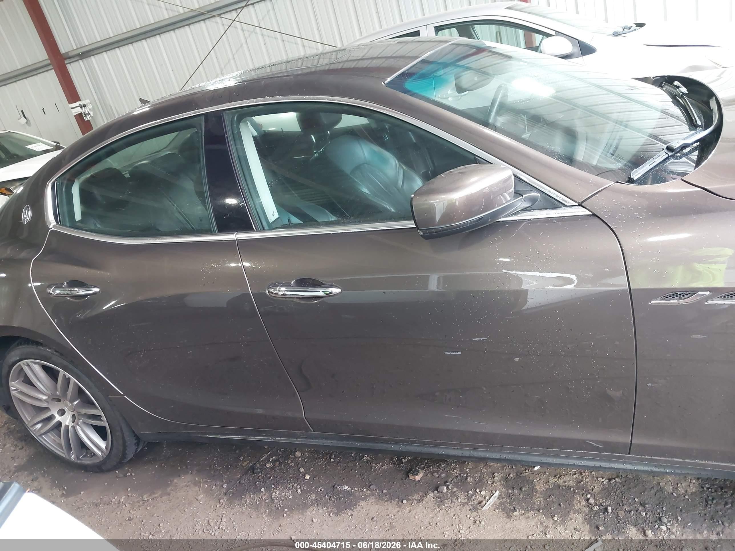 2014 Maserati Ghibli   Brown vin: ZAM57XSA2E1127894
