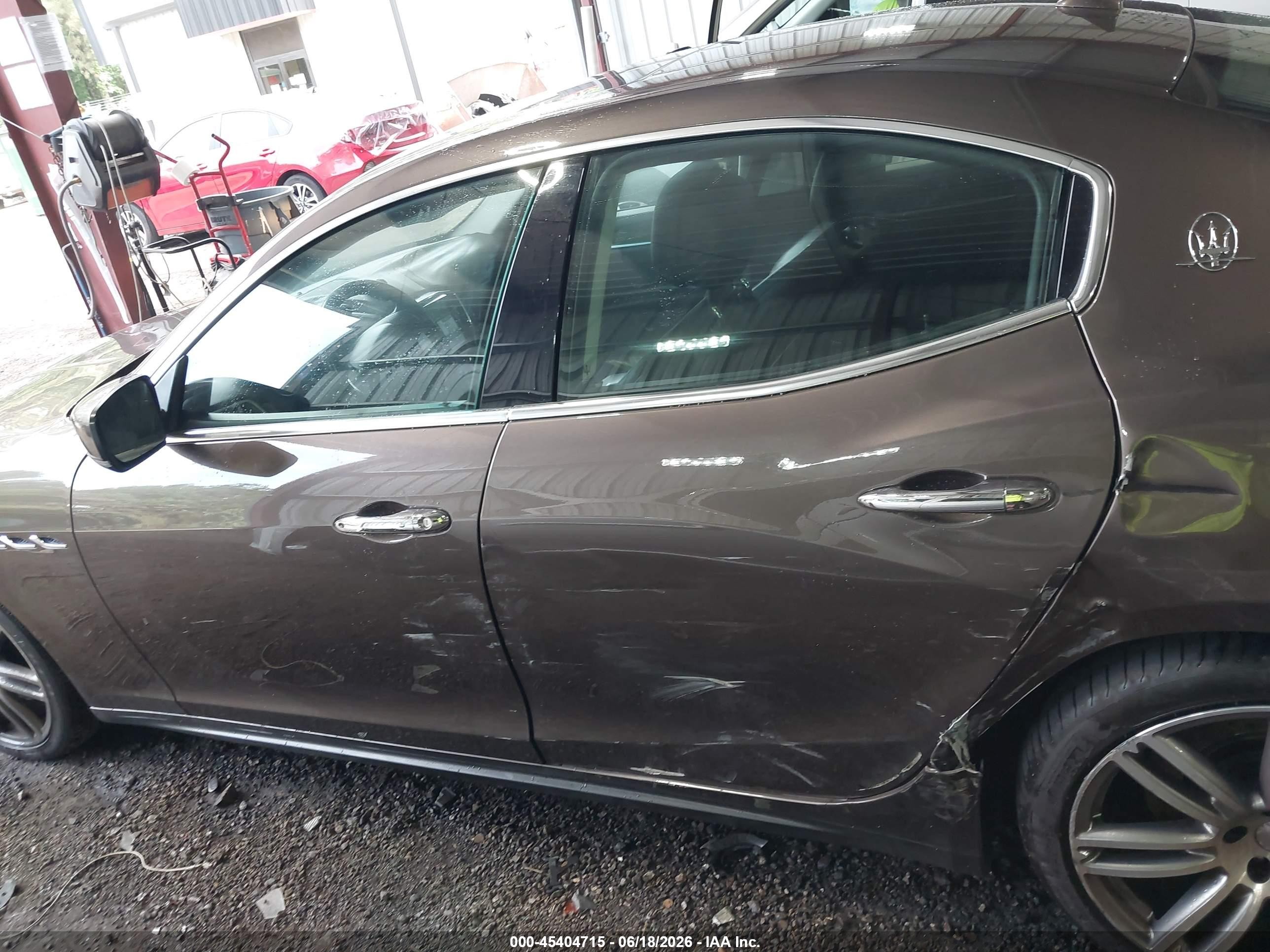 2014 Maserati Ghibli   Brown vin: ZAM57XSA2E1127894