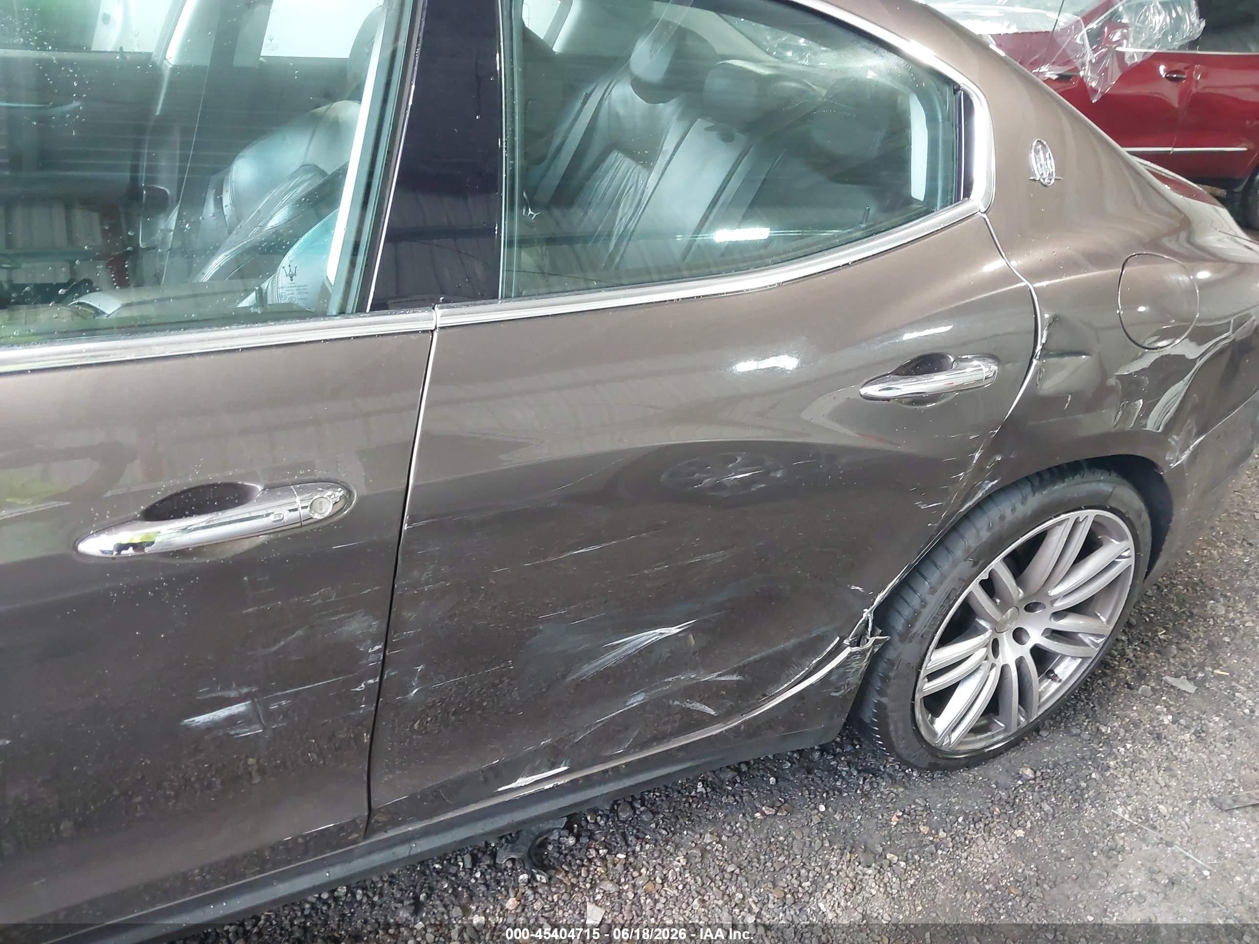 2014 Maserati Ghibli   Brown vin: ZAM57XSA2E1127894