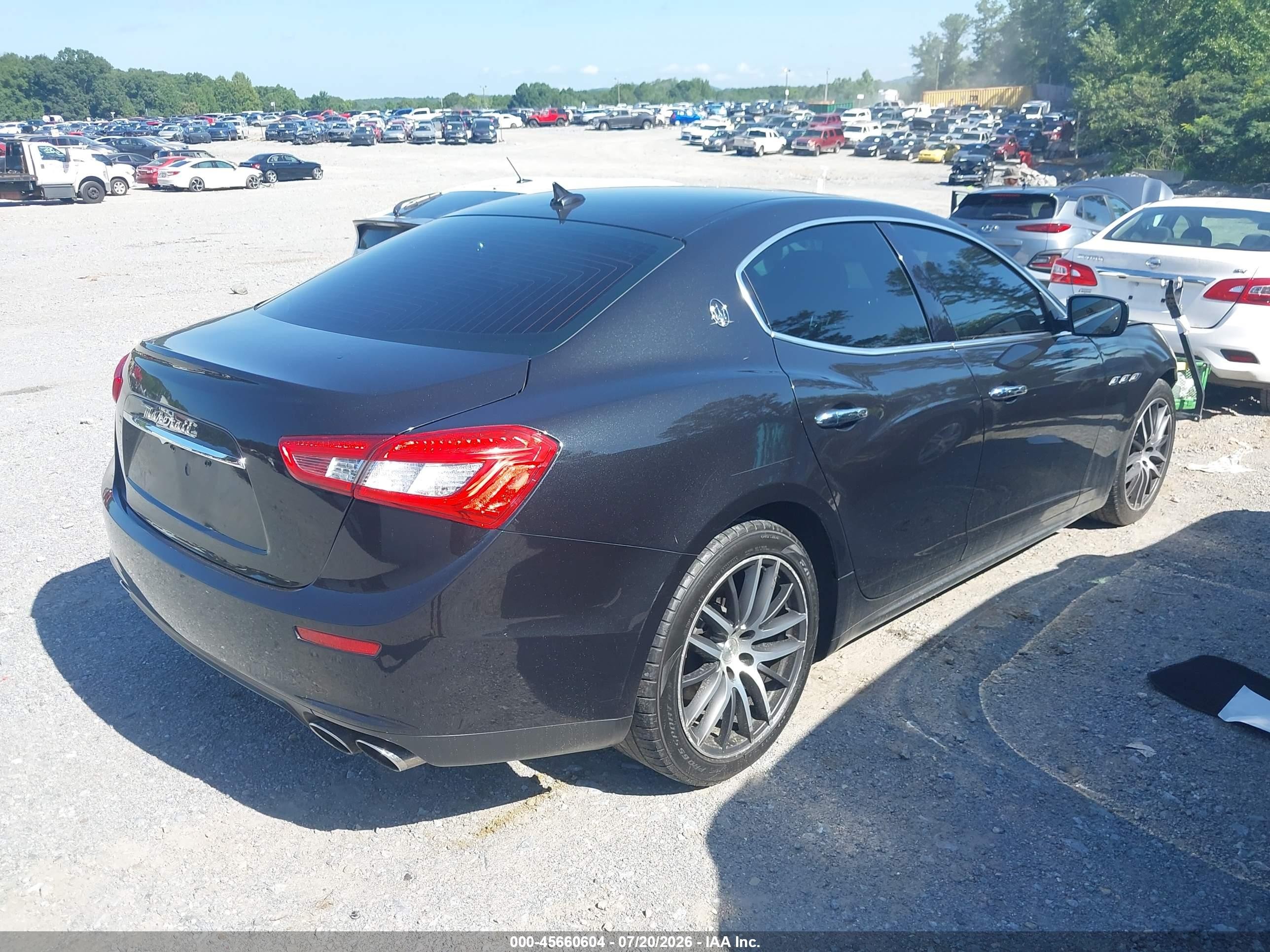 2014 Maserati Ghibli Черный vin: ZAM57XSAXE1085538
