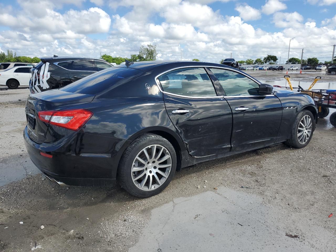 2014 Maserati Ghibli Black vin: ZAM57XSAXE1128131