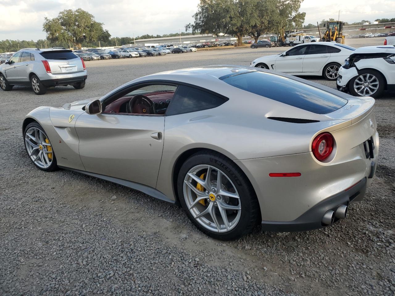 2014 Ferrari F12 Berlinetta  Золотой vin: ZFF74UFAXE0202704