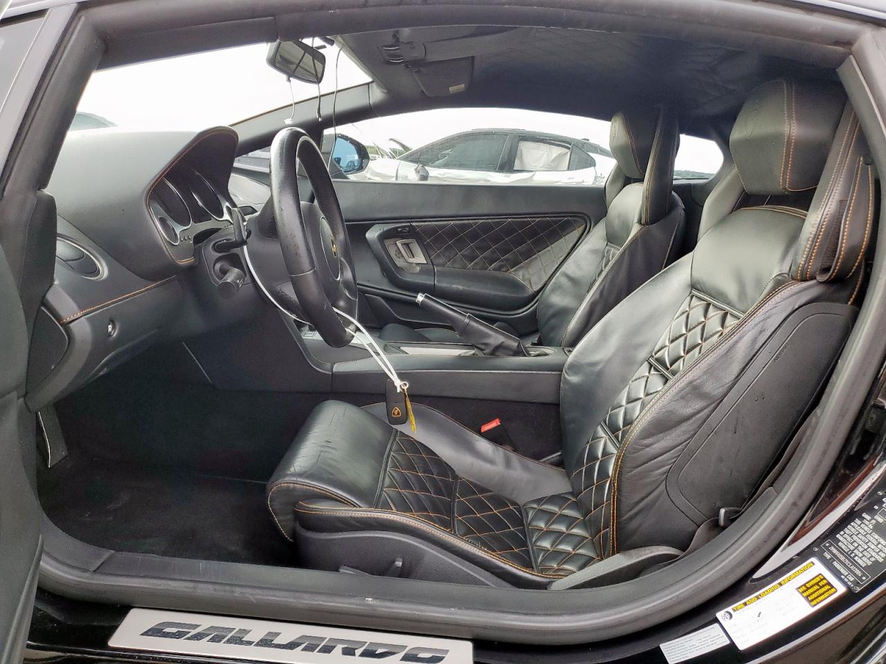 2012 Lamborghini Gallardo    Black vin: ZHWGU5BZXCLA12004