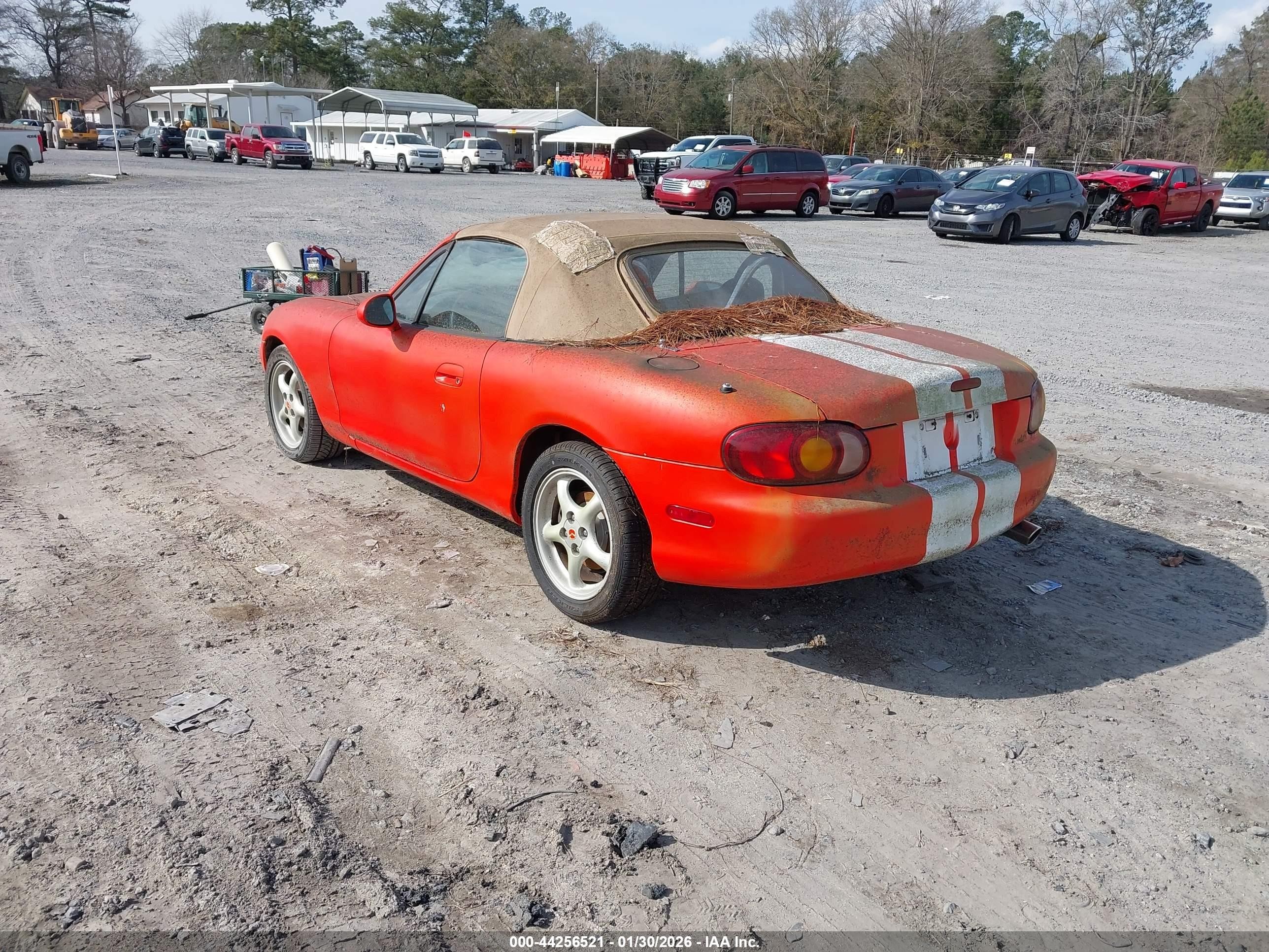 1999 Mazda Mx-5 Miata   Orange vin: jm1nb3531x0102390